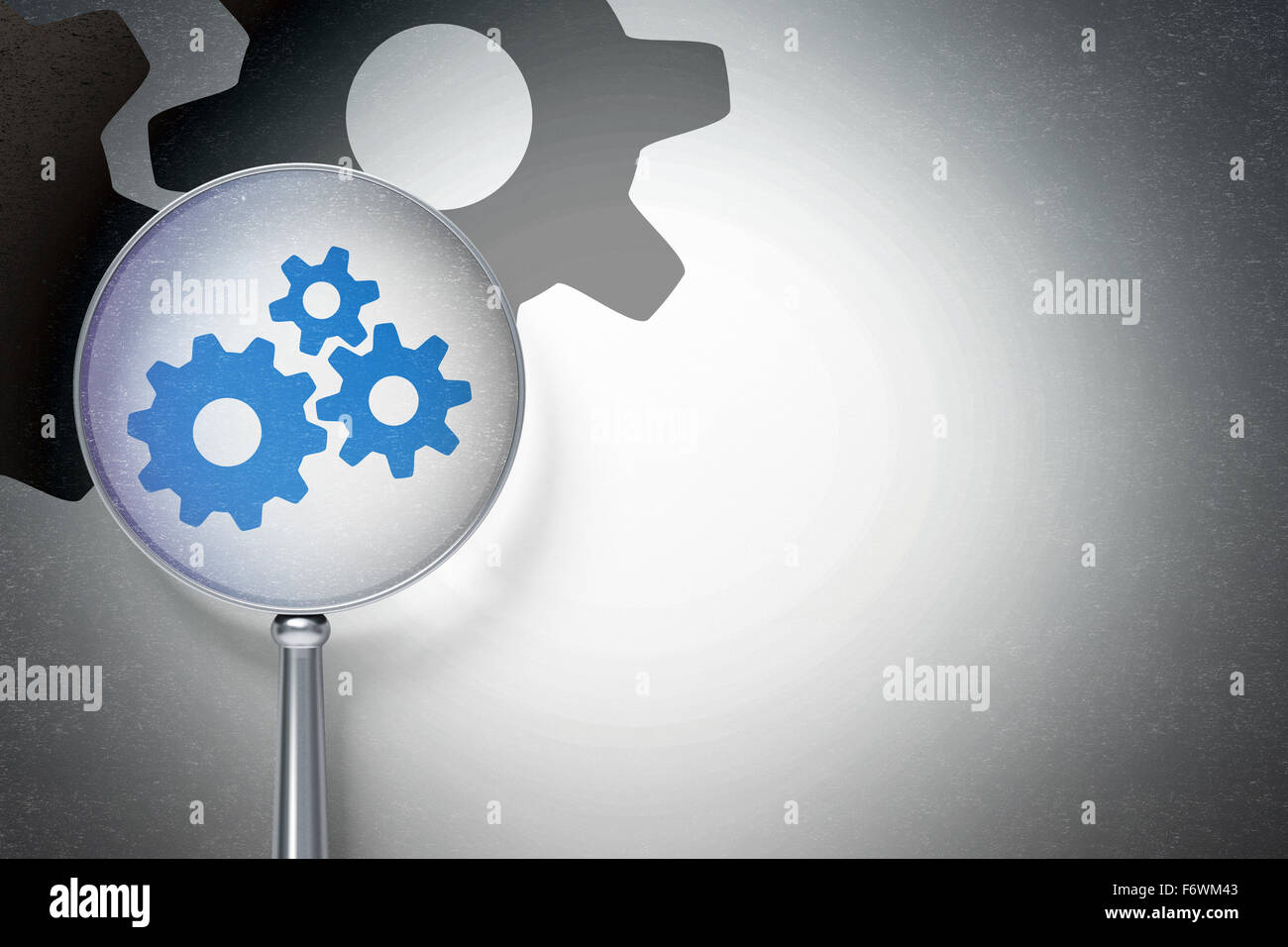 Advertising concept: Gears with optical glass on digital background ...