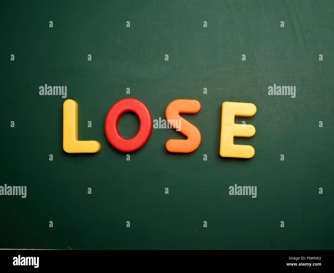 lose concept in colorful letters isolated on blank blackboard Stock ...