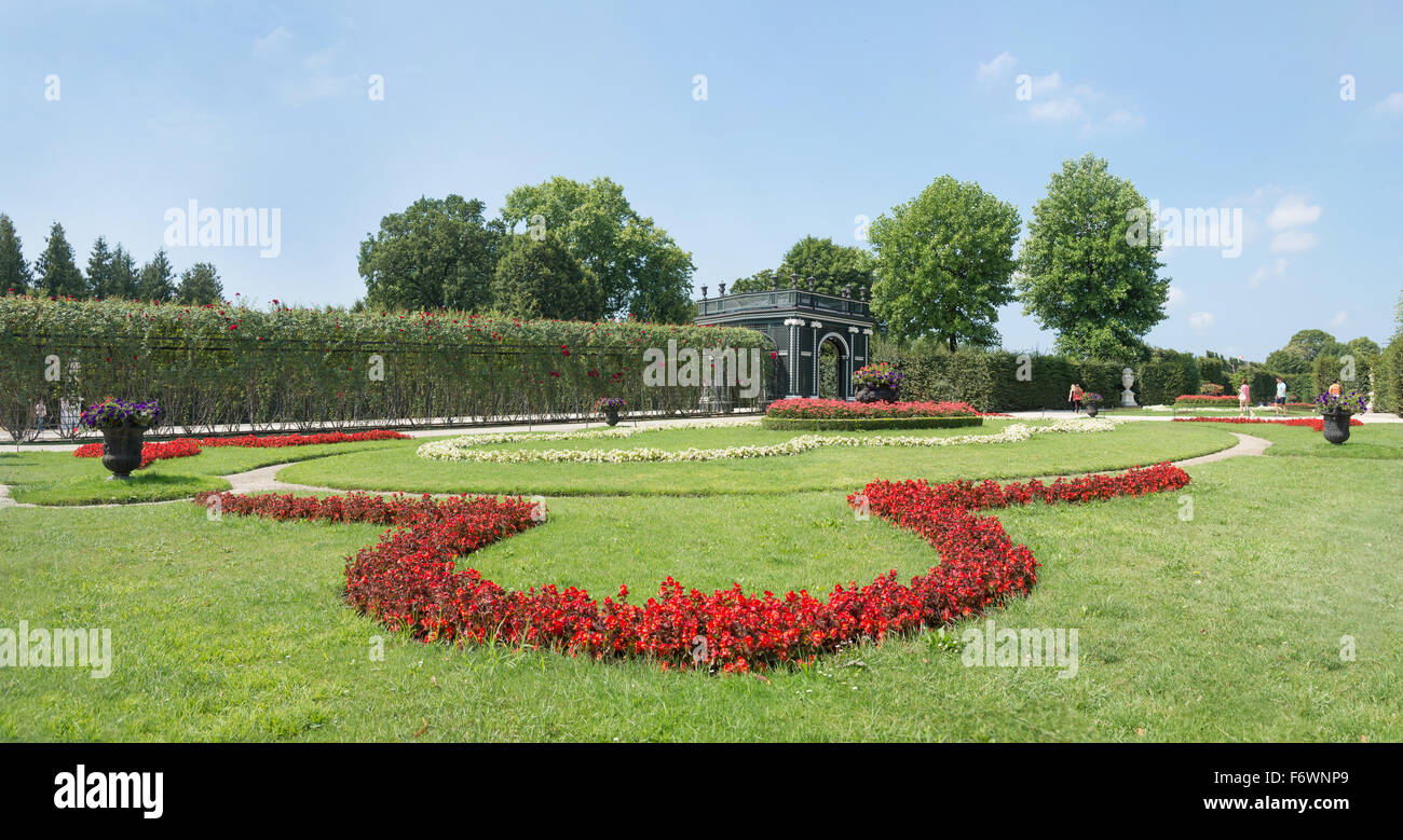 WIEN - AUGUST 3: People visiting giant garden of Schoenbrunn Sissi Castle. Since 1996 the palace and the garden have been declar Stock Photo