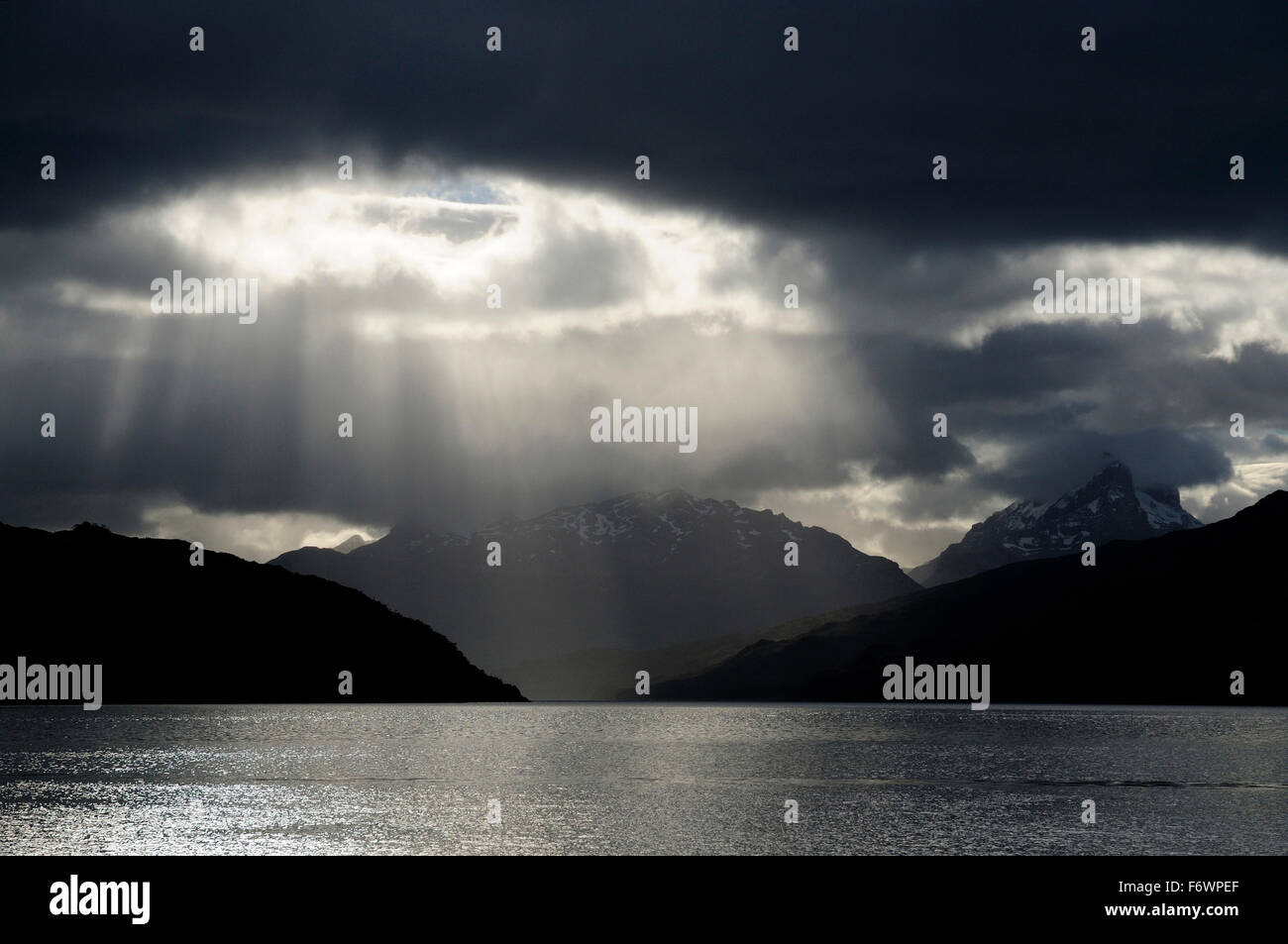 Caleta Escandallo in backlight, Martinez fjord, Tierra del Fuego, Chile Stock Photo