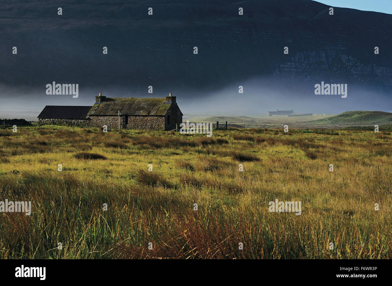 Houses in fog, bay of Rackwick, Orkney Islands, Scotland, Great Britain Stock Photo