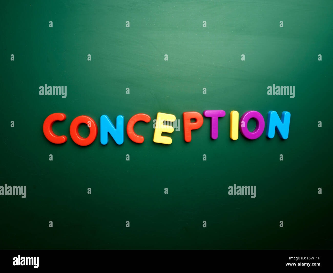 conception concept in colorful letters isolated on blank blackboard Stock Photo