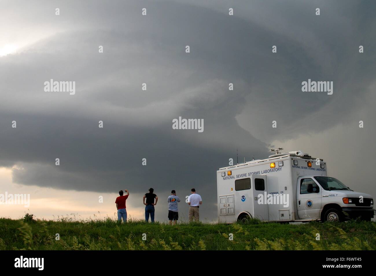 A VORTEX2 field command vehicle from the National Severe Storms Laboratory researches a tornado October 5, 2010 in Kansas. Stock Photo