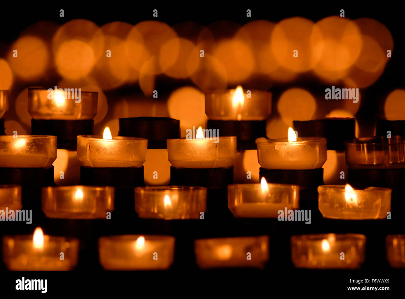 Candles in a catholic church germany europe Stock Photo Alamy