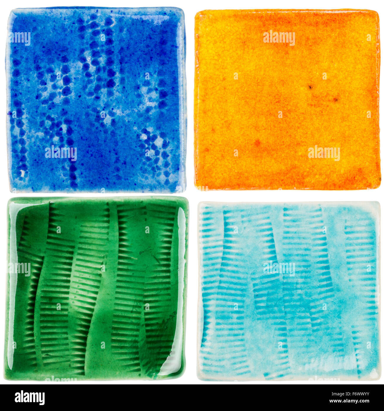 Handmade glazed ceramic tiles isolated on white Stock Photo Alamy