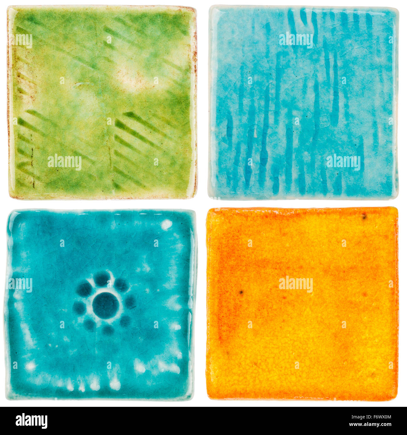 Handmade glazed ceramic tiles isolated on white Stock Photo Alamy