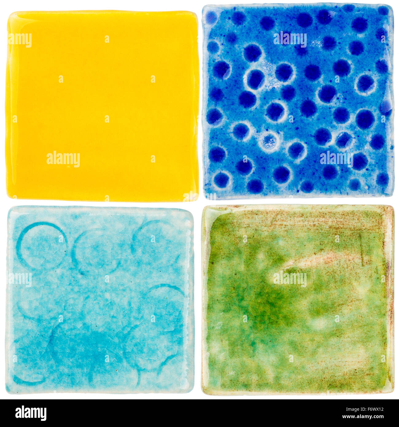 Handmade glazed ceramic tiles isolated on white Stock Photo Alamy