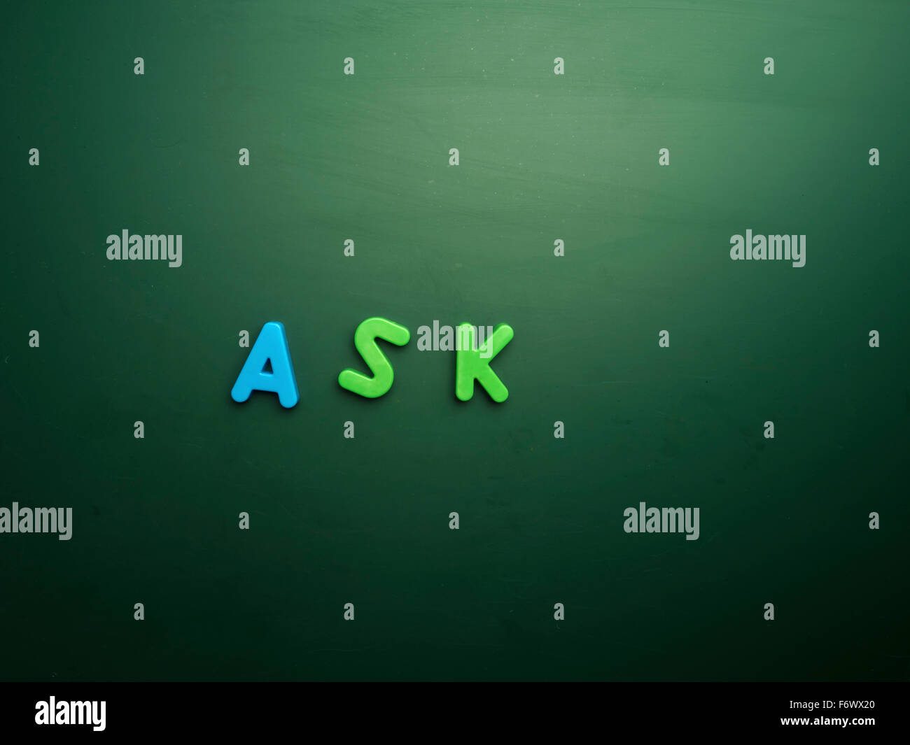 ask concept in colorful letters isolated on blank blackboard Stock Photo
