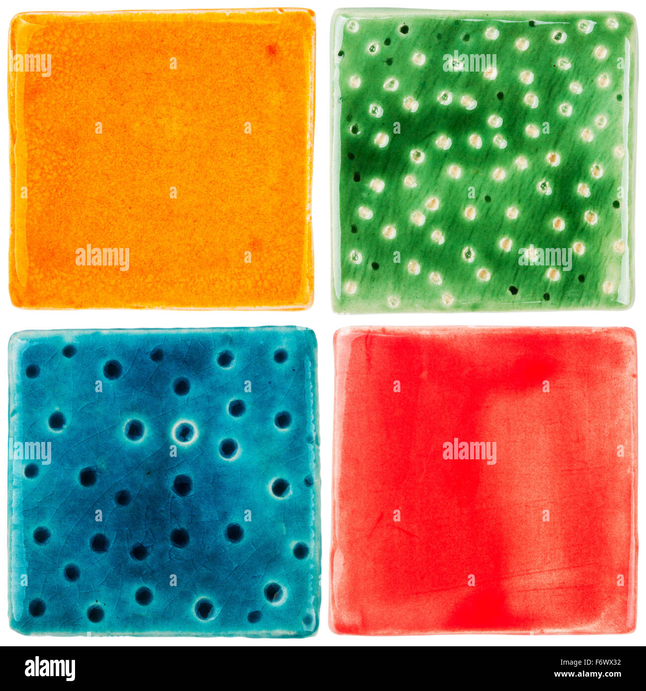 Handmade glazed ceramic tiles isolated on white Stock Photo Alamy