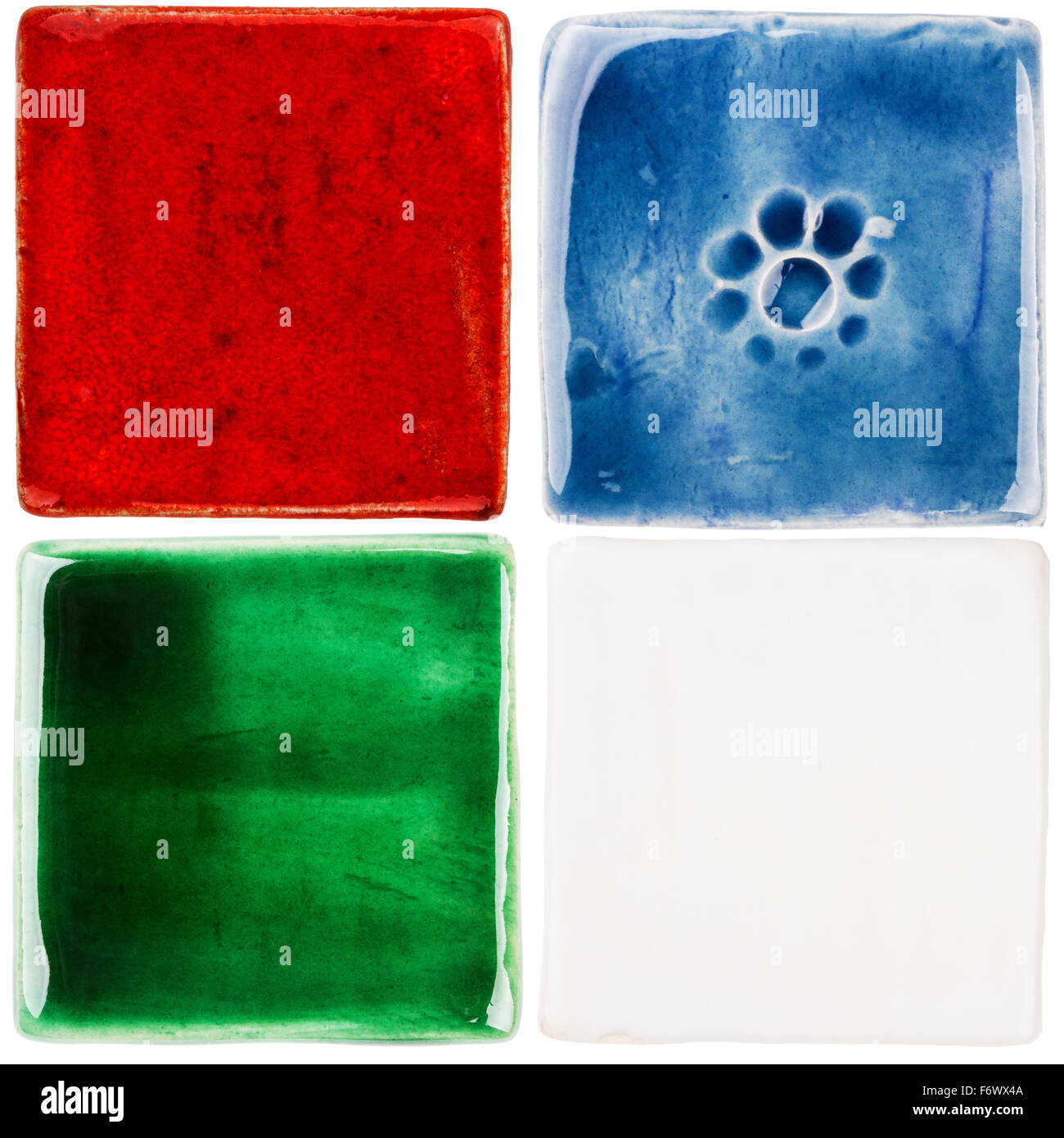 Handmade glazed ceramic tiles isolated on white Stock Photo Alamy