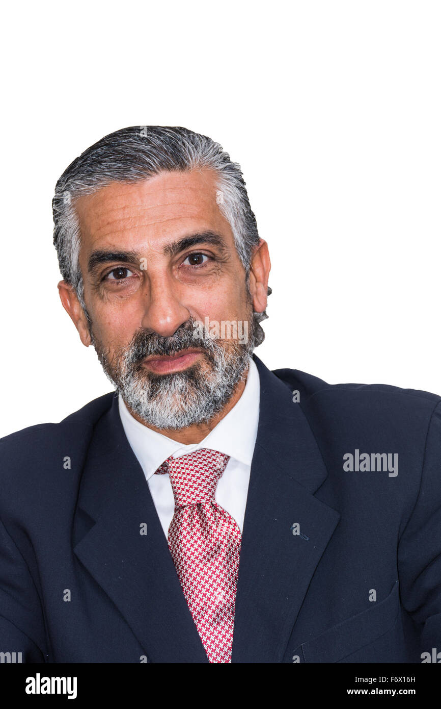 Handsome businessman in his studio, in suits, bearded, grizzled. Stock Photo