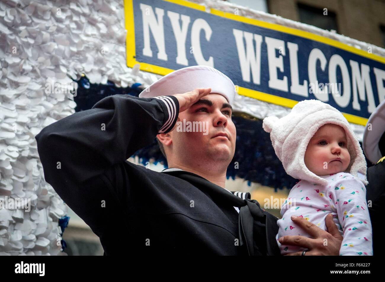 U.S. Navy sailor Petty Officer Collin Gomez salutes during the annual Veterans Day parade during Veterans Week activities November 11, 2015 in New York City, NY. Stock Photo