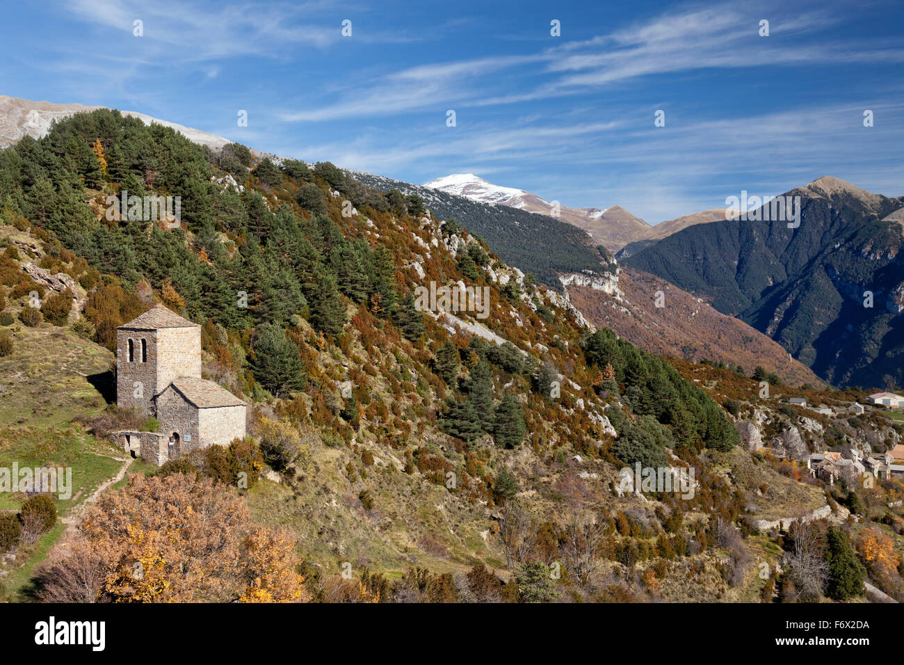 Nice view on high mountains and romanesque chapel in Tella village Sobrarbe county Huesca Aragon Spain. Tella village. Stock Photo