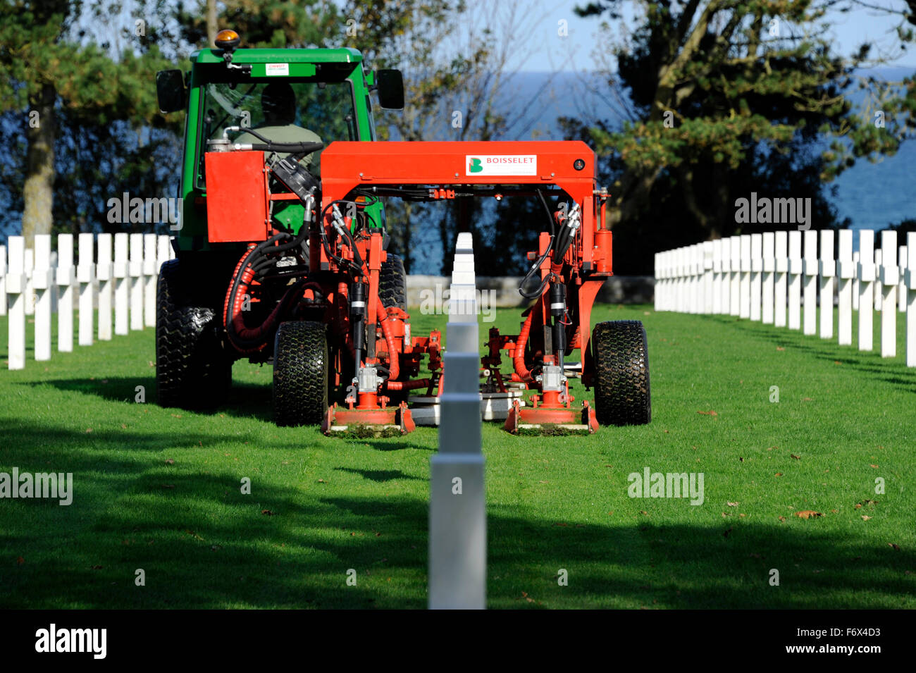 D Day,Graves,lawn mowing in Normandy American Cemetery,Omaha Stock