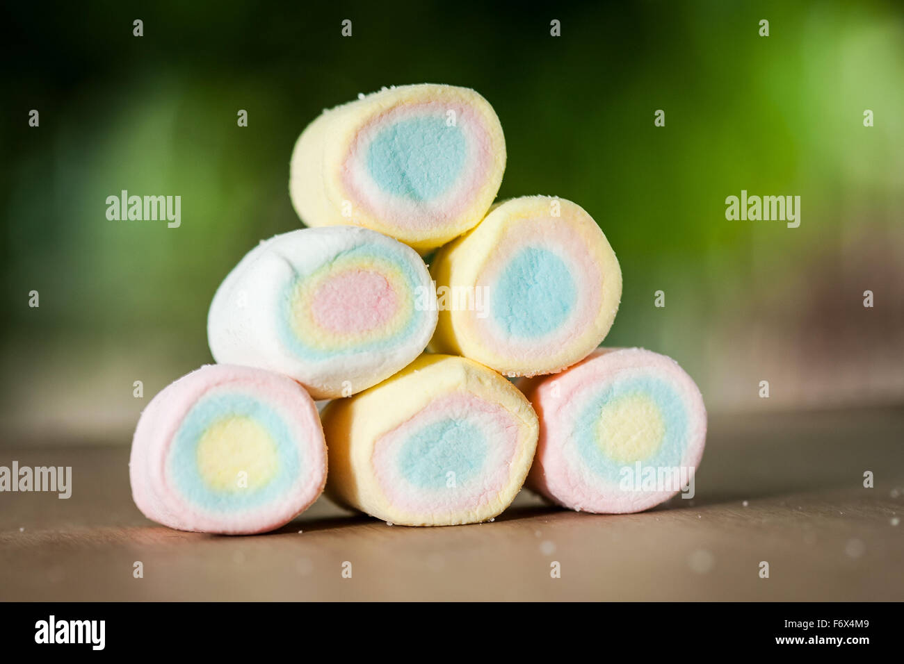 marshmallow in natural light and background blur effect green leaves Stock Photo