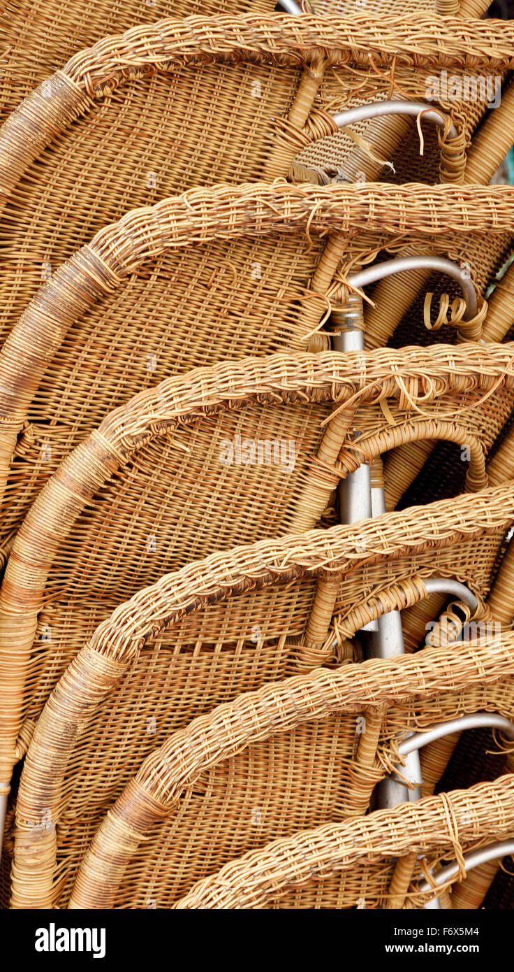 Stacked wicker chairs Stock Photo