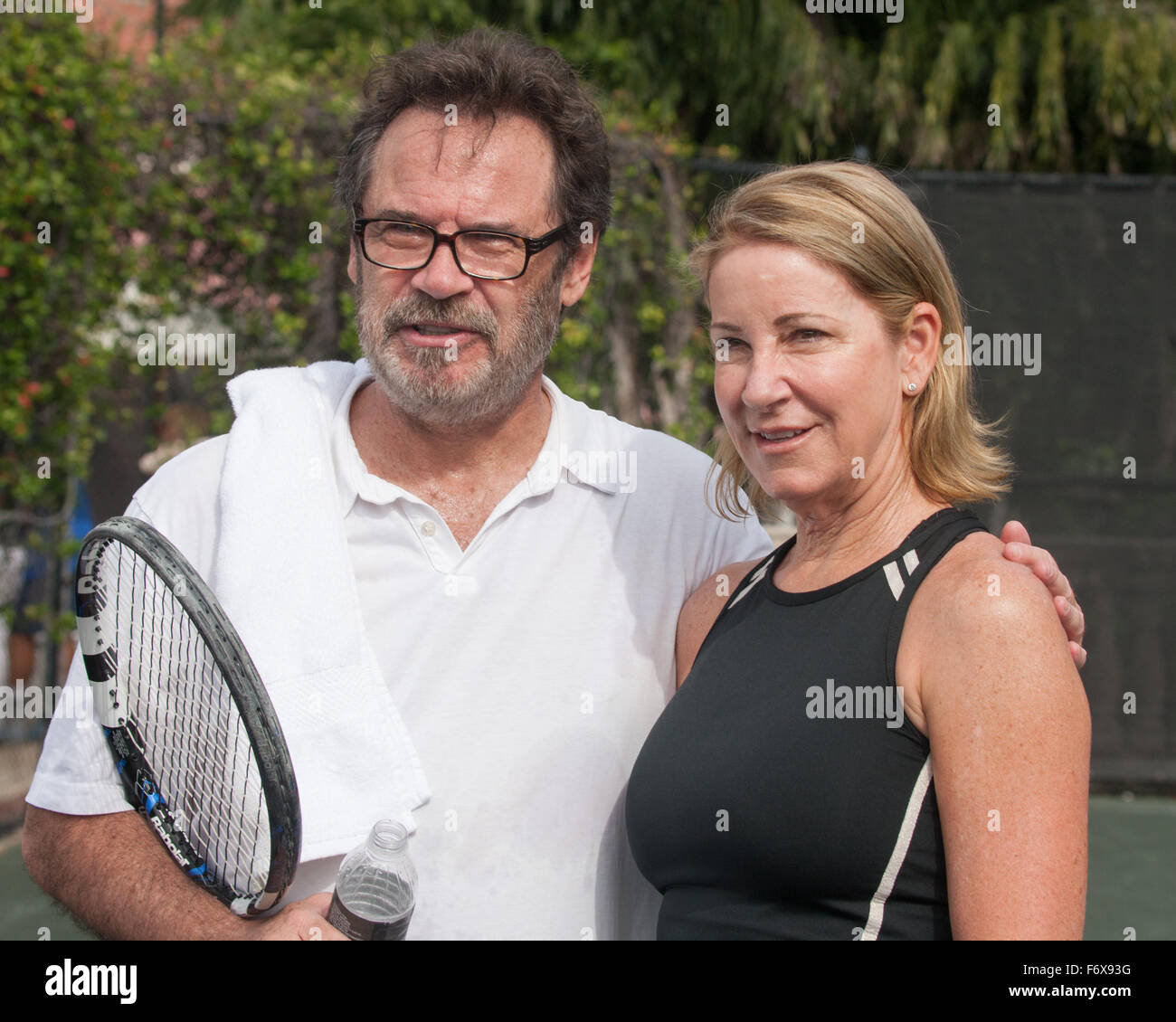 Boca Raton, Florida, US. 20th Nov, 2015. Talk show host, comedian and TV & radio personality Dennis Miller with tennis legend Chris Evert, during media day, at the 26th Annual Chris Evert/Raymond James Pro-Celebrity Tennis Classic at the Boca Raton Resort & Club in Florida. Chris Evert Charities has raised almost $ 22 million for Florida's most at-risk children. Credit:  Arnold Drapkin/ZUMA Wire/Alamy Live News Stock Photo