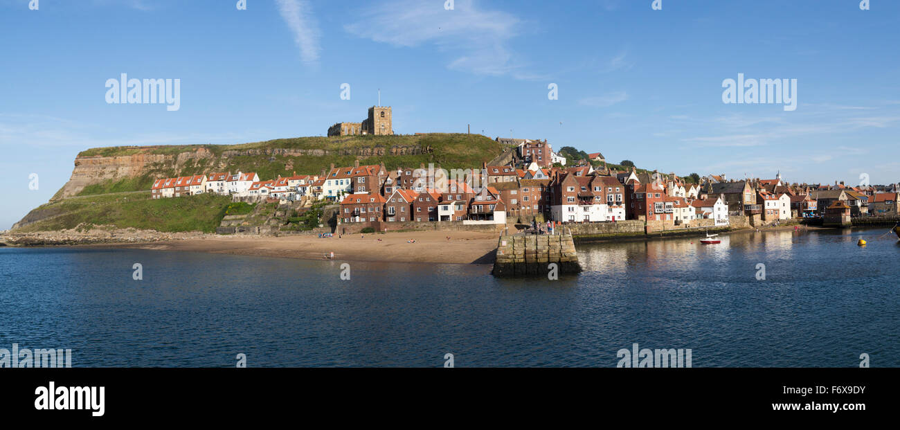 A seaside town and small harbour at the mouth of the River Esk; Whitby, Yorkshire, England Stock Photo