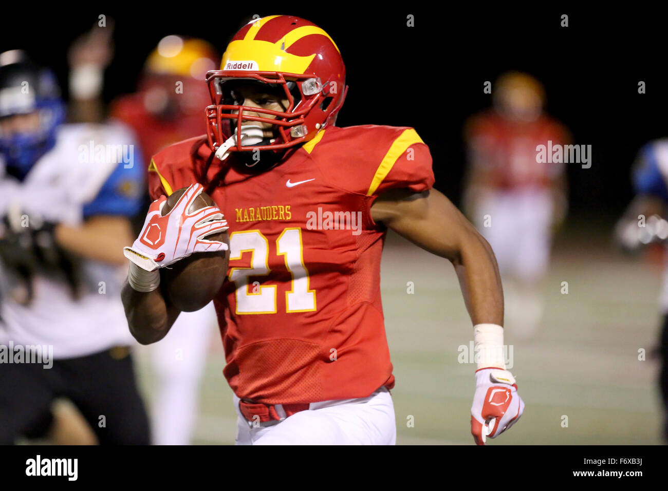 Clearwater, Florida, USA. 20th Nov, 2015. DOUGLAS R. CLIFFORD | Times.Clearwater Central Catholic High School's C.J. Cotman (21) delivers a Marauders interception for a second quarter touchdown against John Carroll Catholic High School during Friday's (11/20/15) regional final at CCC in Clearwater. © Douglas R. Clifford/Tampa Bay Times/ZUMA Wire/Alamy Live News Stock Photo