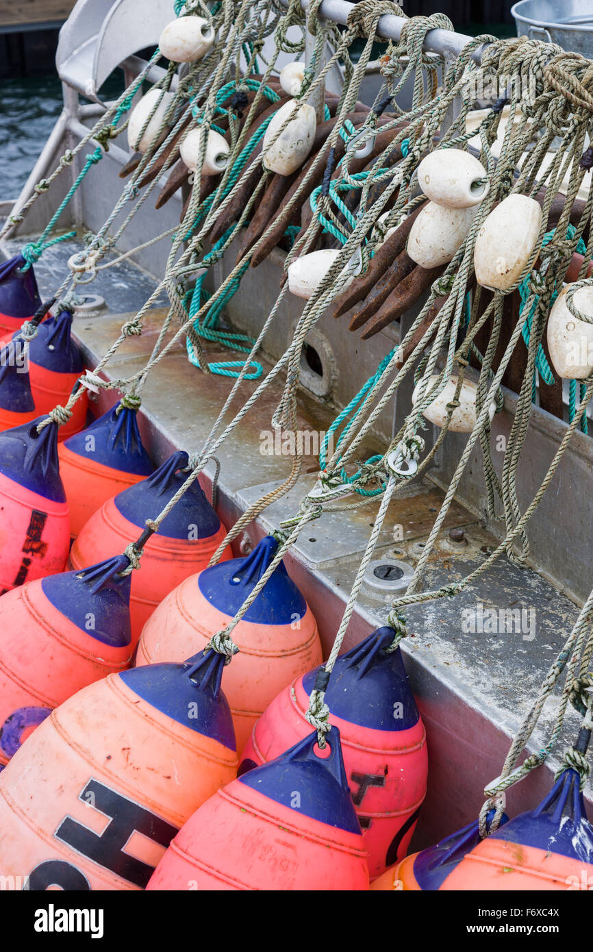 Bouys hang off a Boat in St. Paul Harbor, St. Paul Island, Southwestern Alaska, USA, Summer Stock Photo