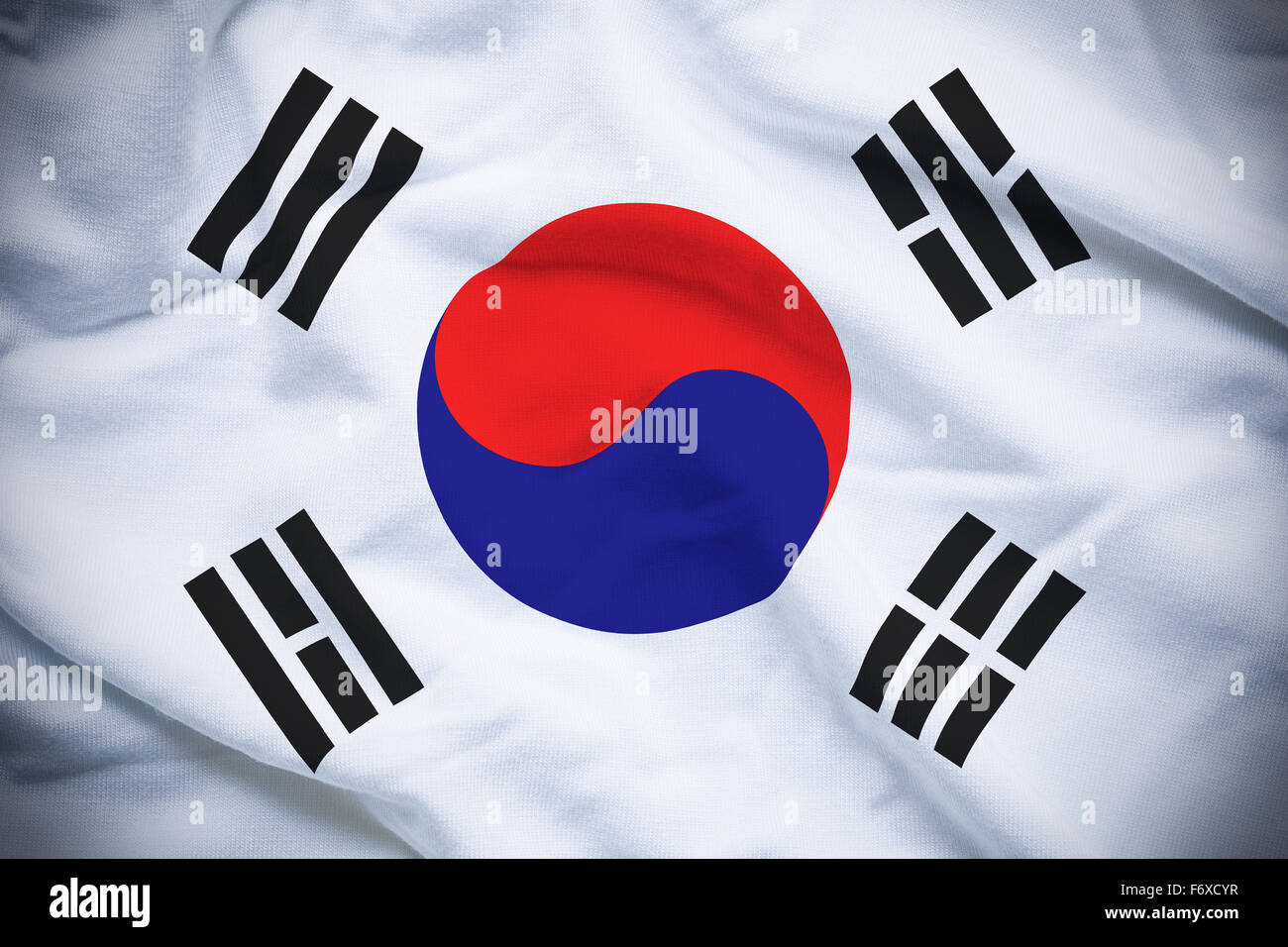 Wavy and rippled national flag of South Korea background. Stock Photo