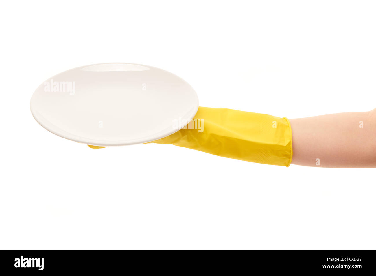 Close up of female hand in yellow protective rubber glove holding clean ...