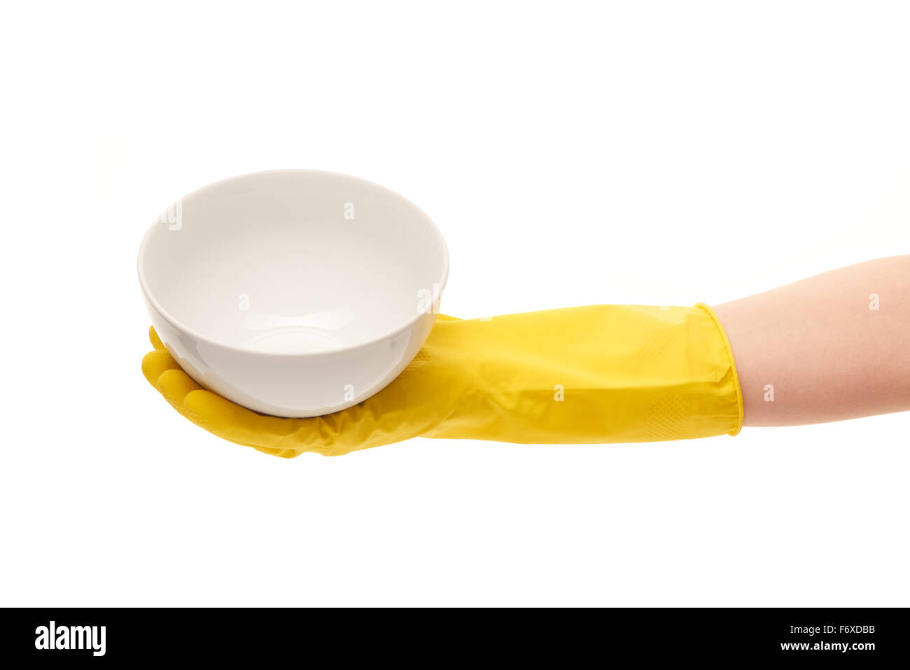 Close up of female hand in yellow protective rubber glove holding clean ...