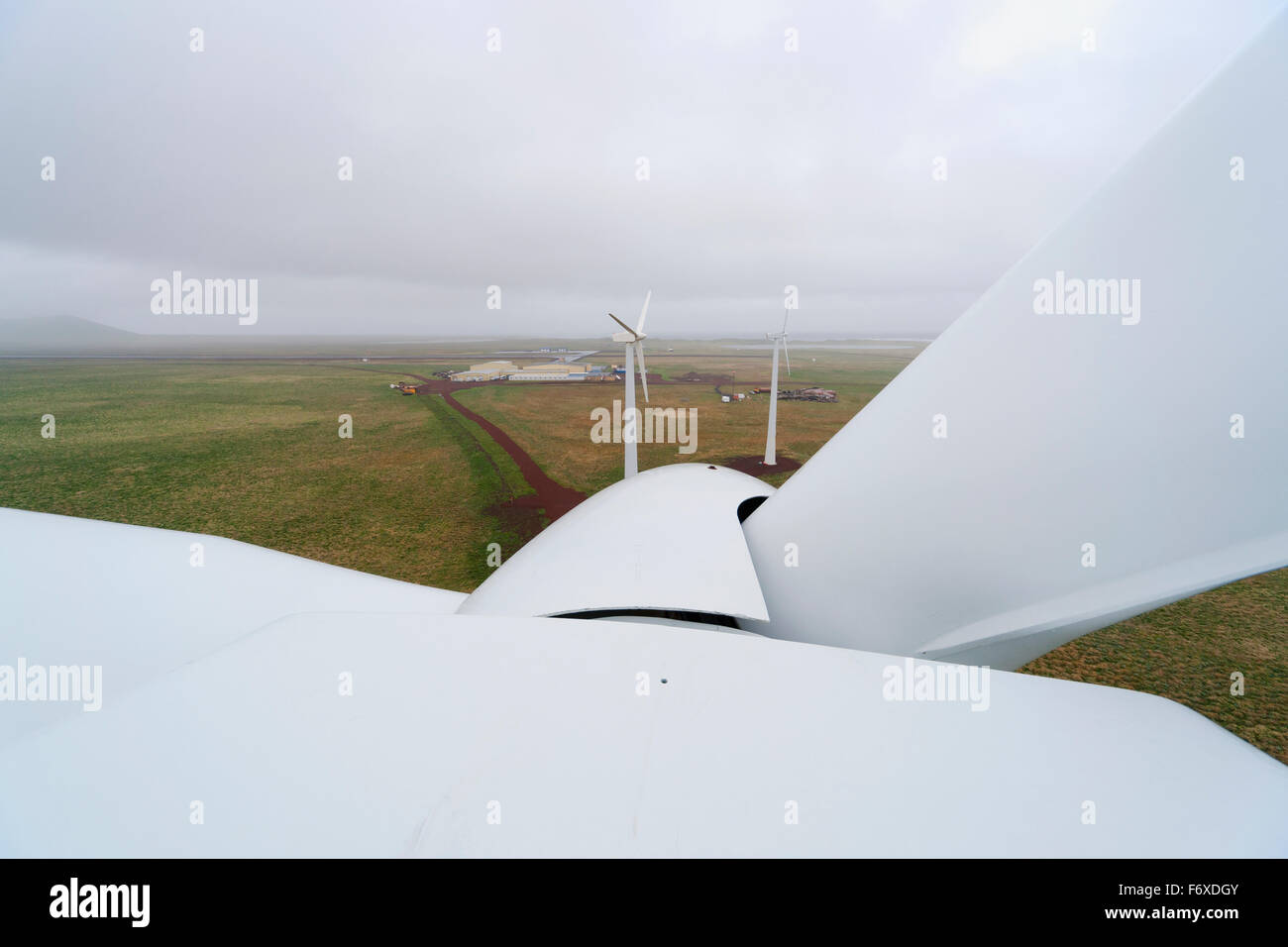 The nose cone of a rotor of a wind turbine as viewed from atop the Nacelle wind turbine, St. Paul Island, Southwestern Alaska, USA, Summer Stock Photo