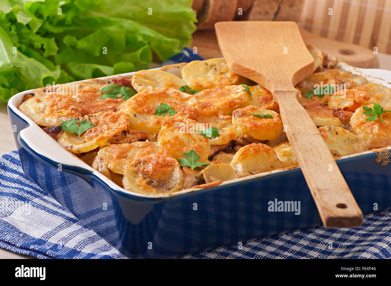 Potato casserole with meat and mushrooms with cheese crust Stock Photo