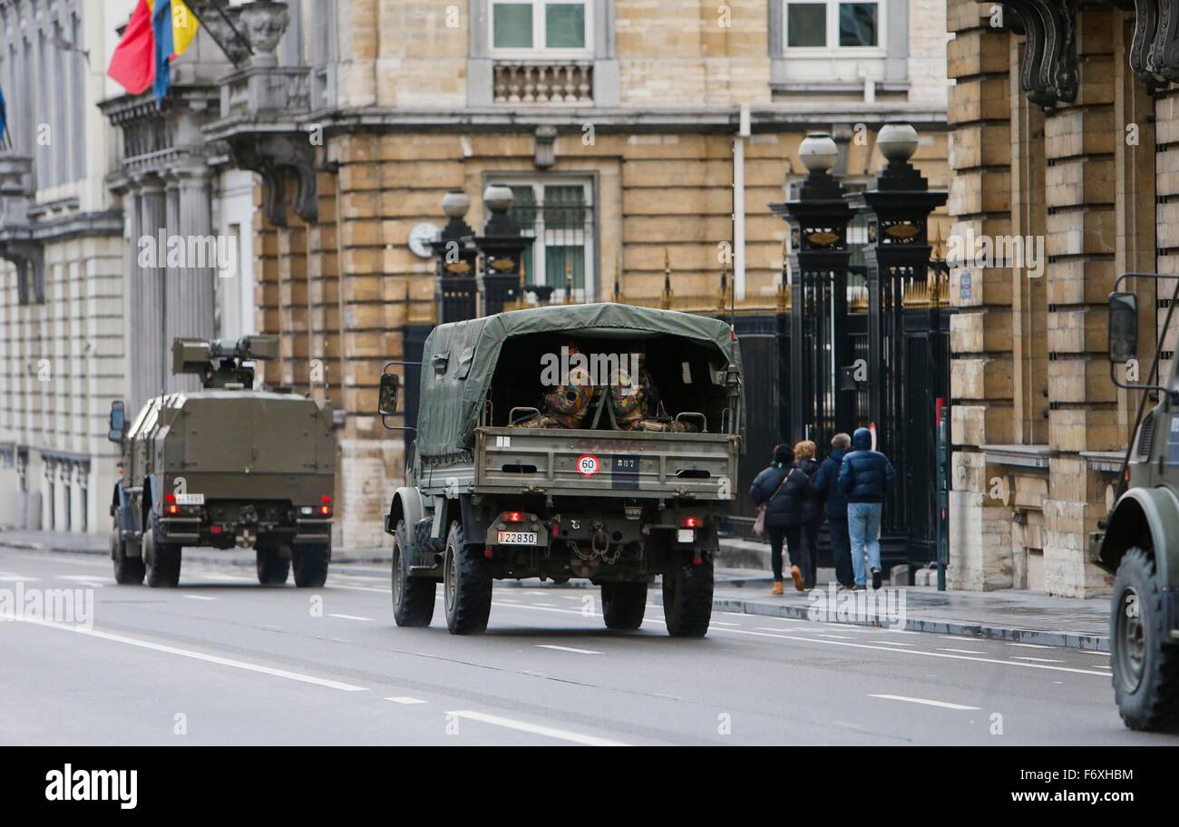 Brussels, Belgium. 21st Nov, 2015. Military vehicles are seen running ...