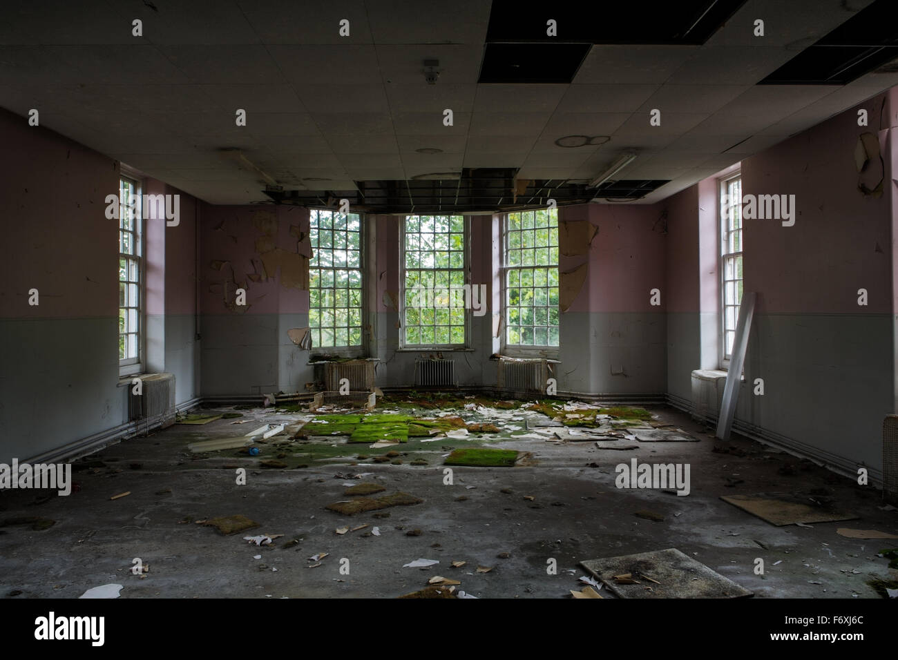 inside view of a deserted run down building Stock Photo - Alamy