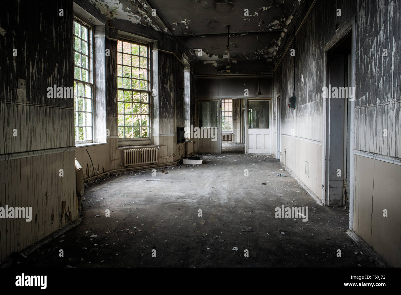 inside view of a deserted run down building Stock Photo - Alamy