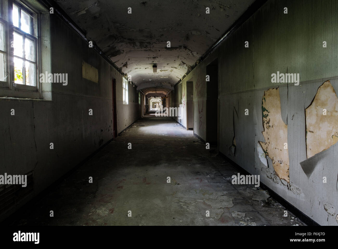 inside view of a deserted run down building Stock Photo - Alamy