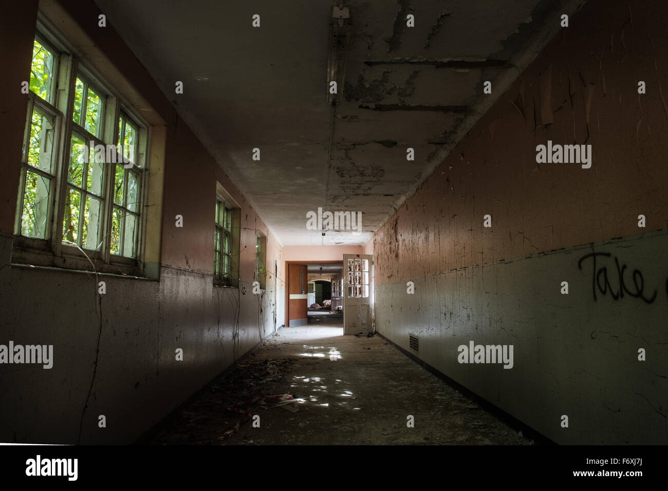 inside view of a deserted run down building Stock Photo - Alamy