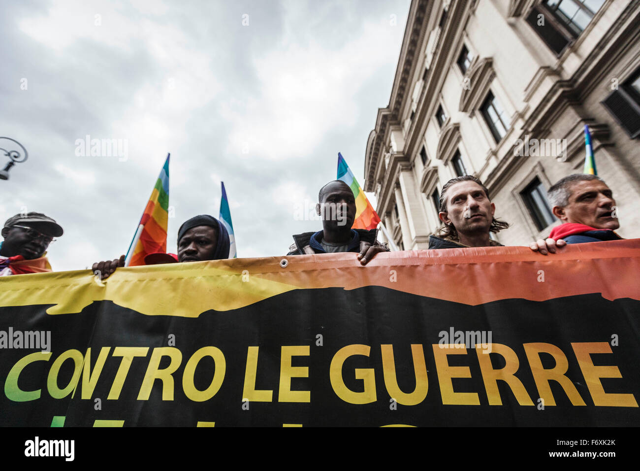 Rome, Italy. 21st Nov, 2015. Members of the Italian trade union FIOM CGIL hold a banner reading 'Against the war' during an anti-government rally to protest against the Italian government's 'Stability Law'. Thousands of demonstrators take part in an anti-government rally called by FIOM CGIL, Italy's metalworkers' trade union, in downtown Rome to protest against the Italian government's 'Stability Law'. Credit: Giuseppe Ciccia/Pacific Press/Alamy Live News Stock Photo
