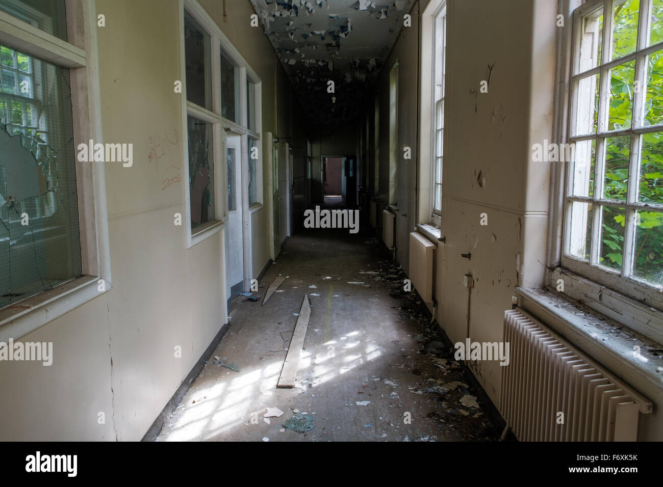 inside view of a deserted run down building Stock Photo - Alamy