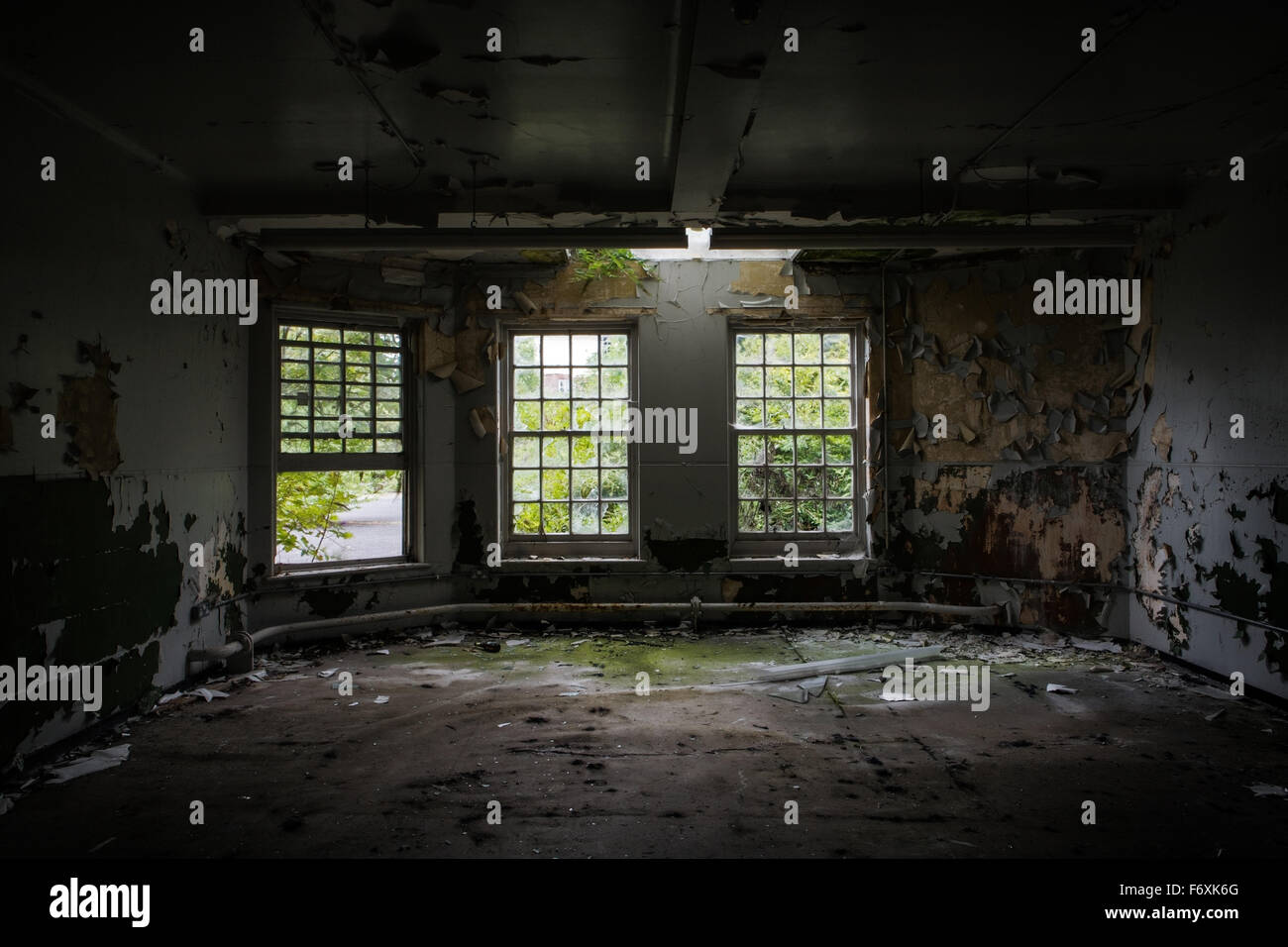 inside view of a deserted run down building Stock Photo - Alamy