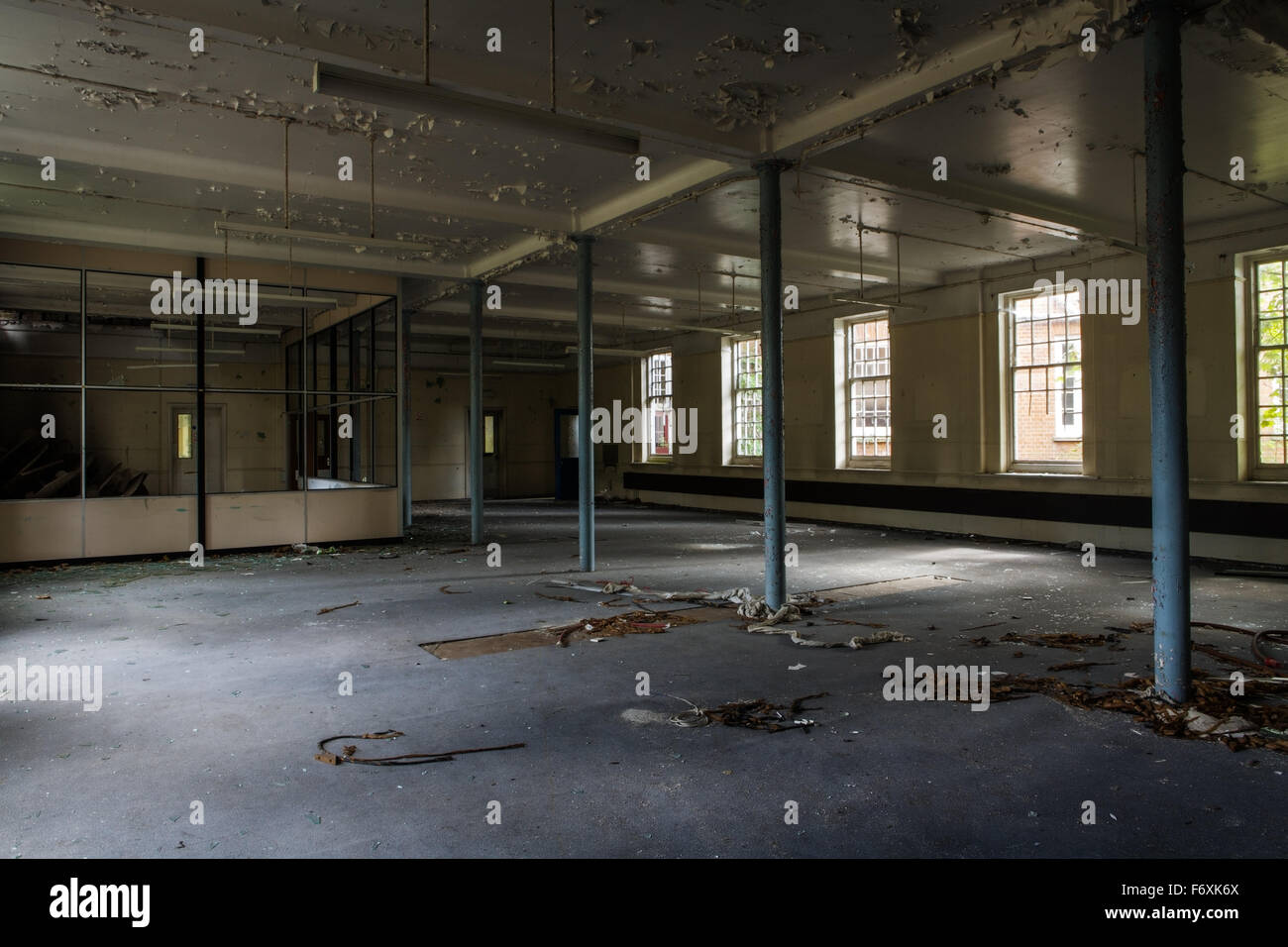 inside view of a deserted run down building Stock Photo - Alamy