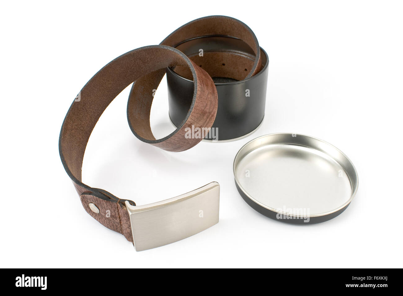Women's leather belt in aluminum box isolated on white Stock Photo