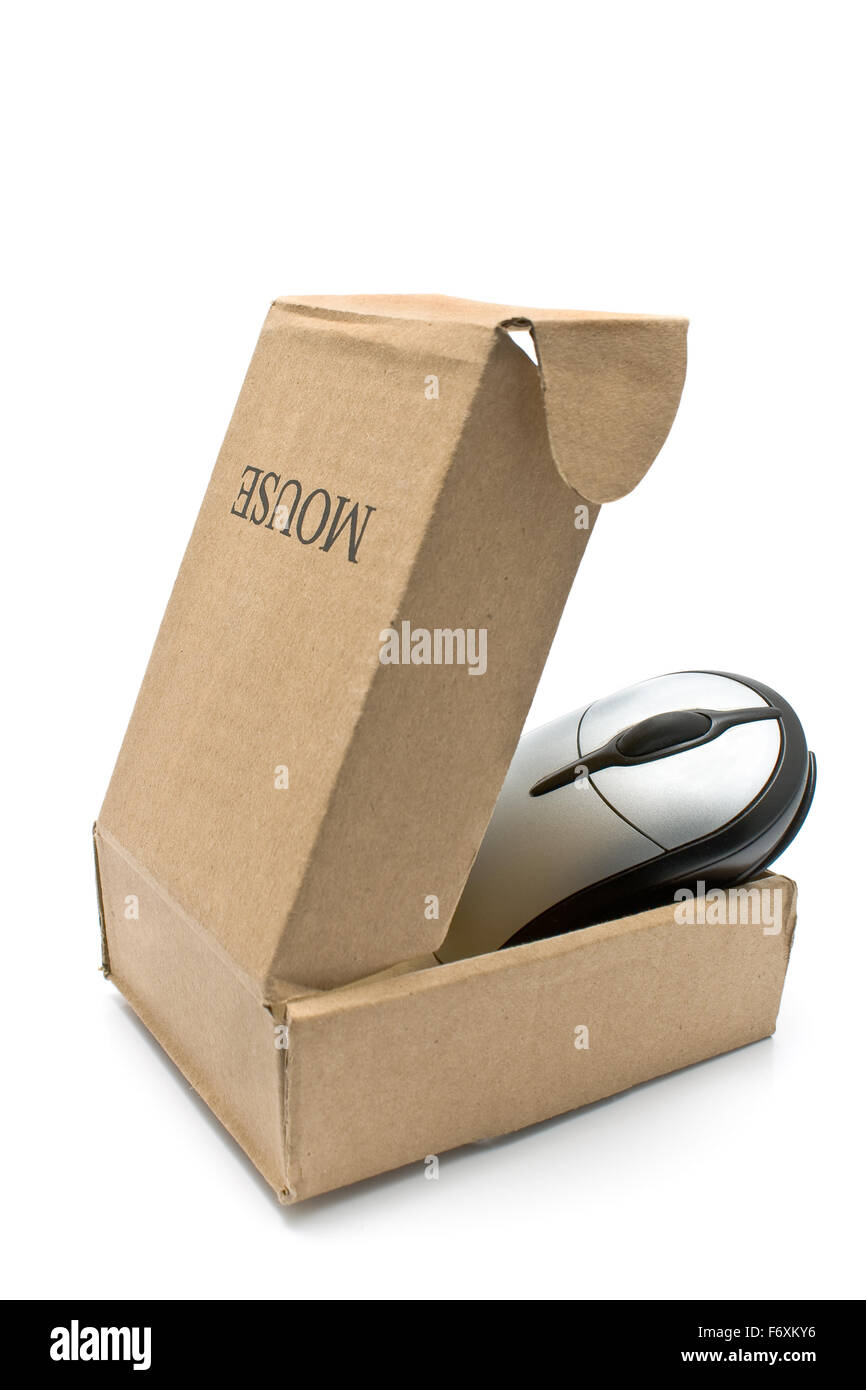 Computer mouse in cardboard box isolated on  white Stock Photo