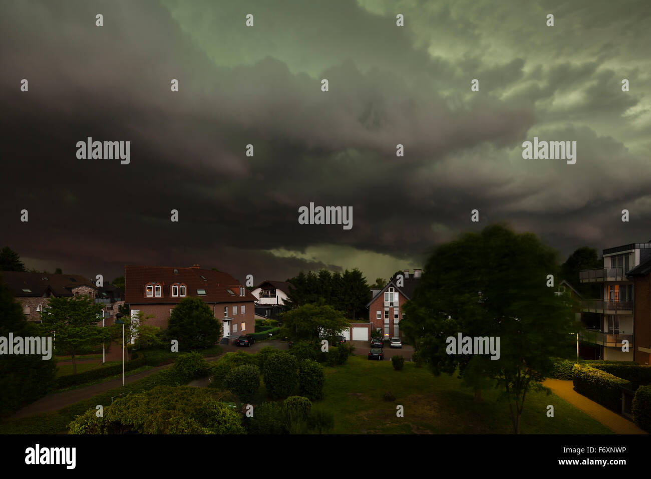 Approaching Thunderstorm Over Residential District Stock Photo
