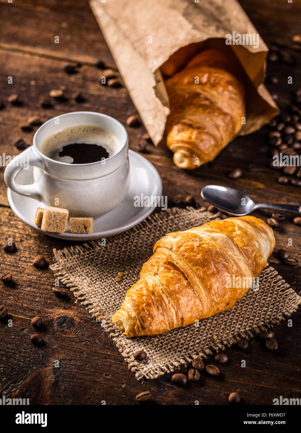 Croissant and coffee on vintage style Stock Photo