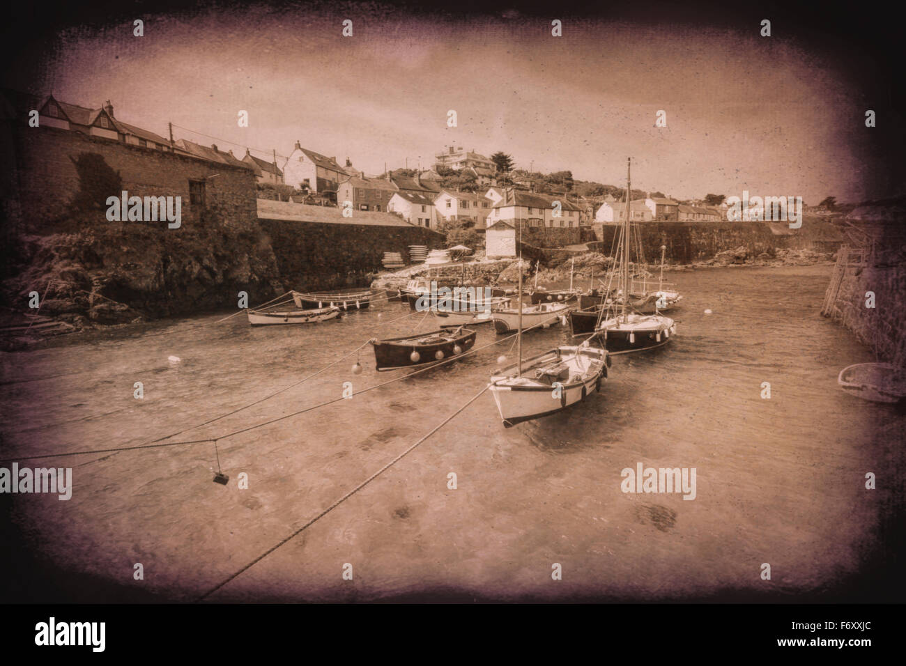 Beautiful harbour Cornwall England fishing village of Coverack Lizard Peninsula vintage vignette effect Stock Photo