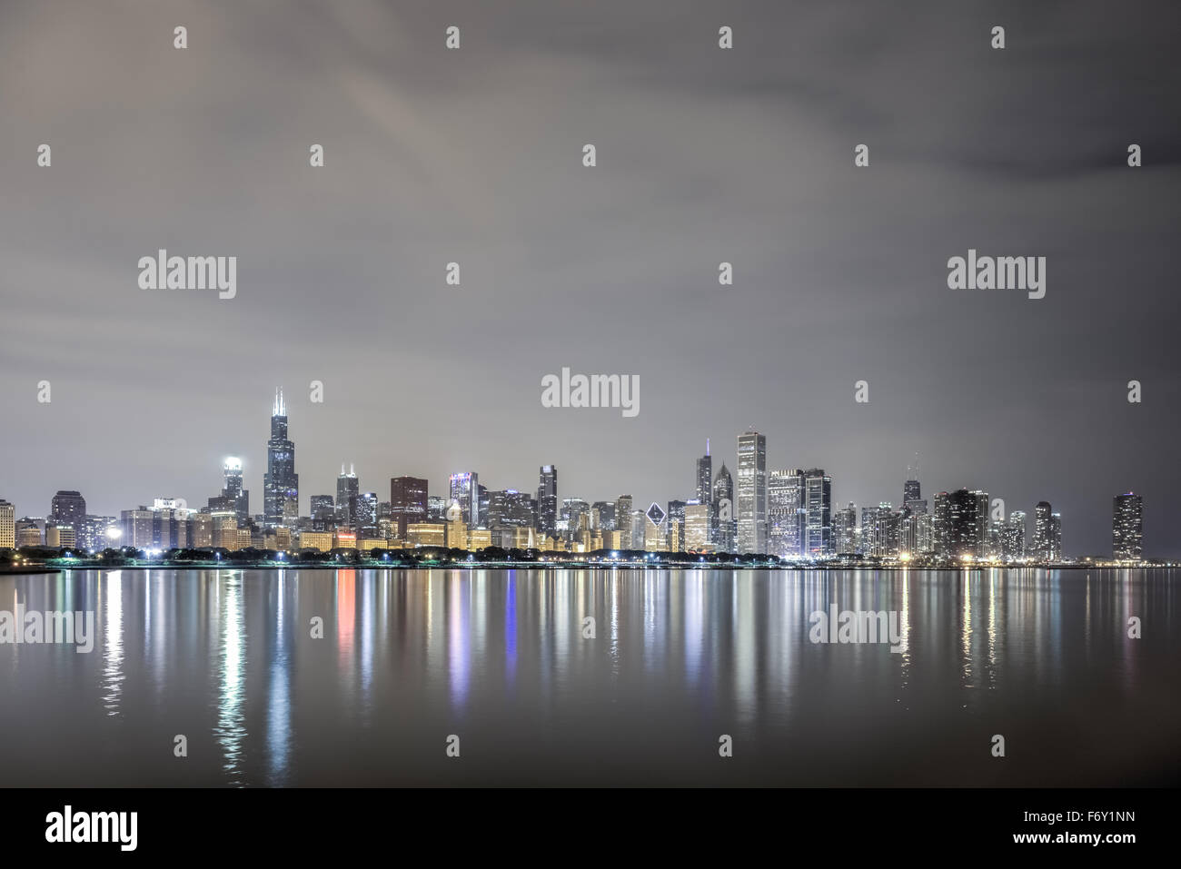 View of the Chicago Skyline over Lake Michigan at night Stock Photo - Alamy