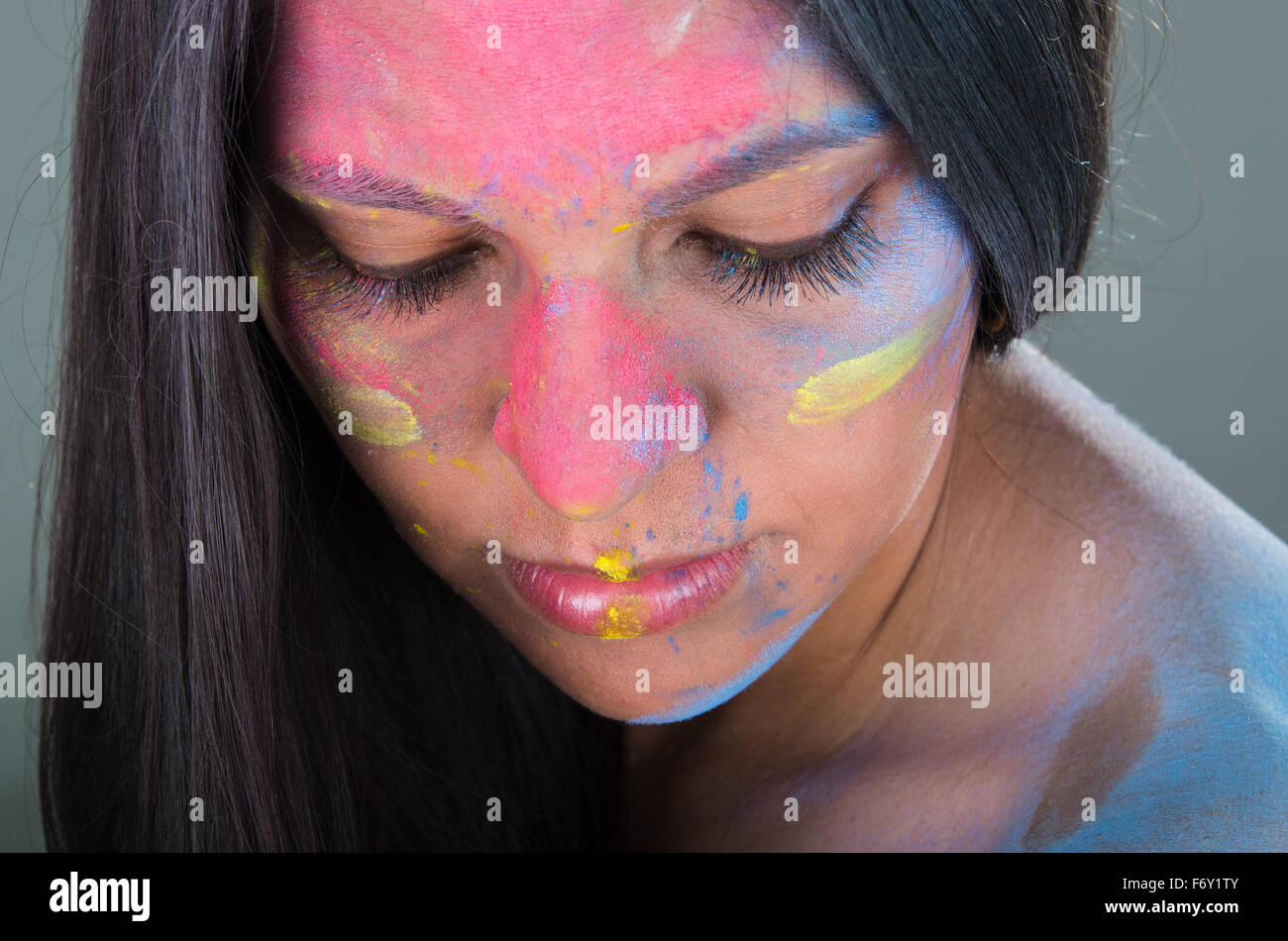 Closeup portrait of latin girl with painted face Stock Photo