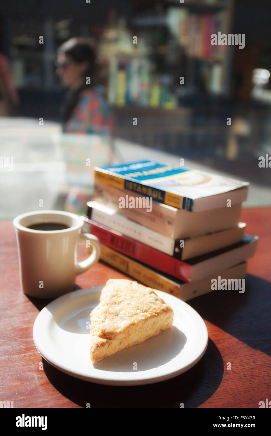 Coffee and a scone in one of the world's largest bookstores, Powell's City of Books in Portland, Oregon. Stock Photo