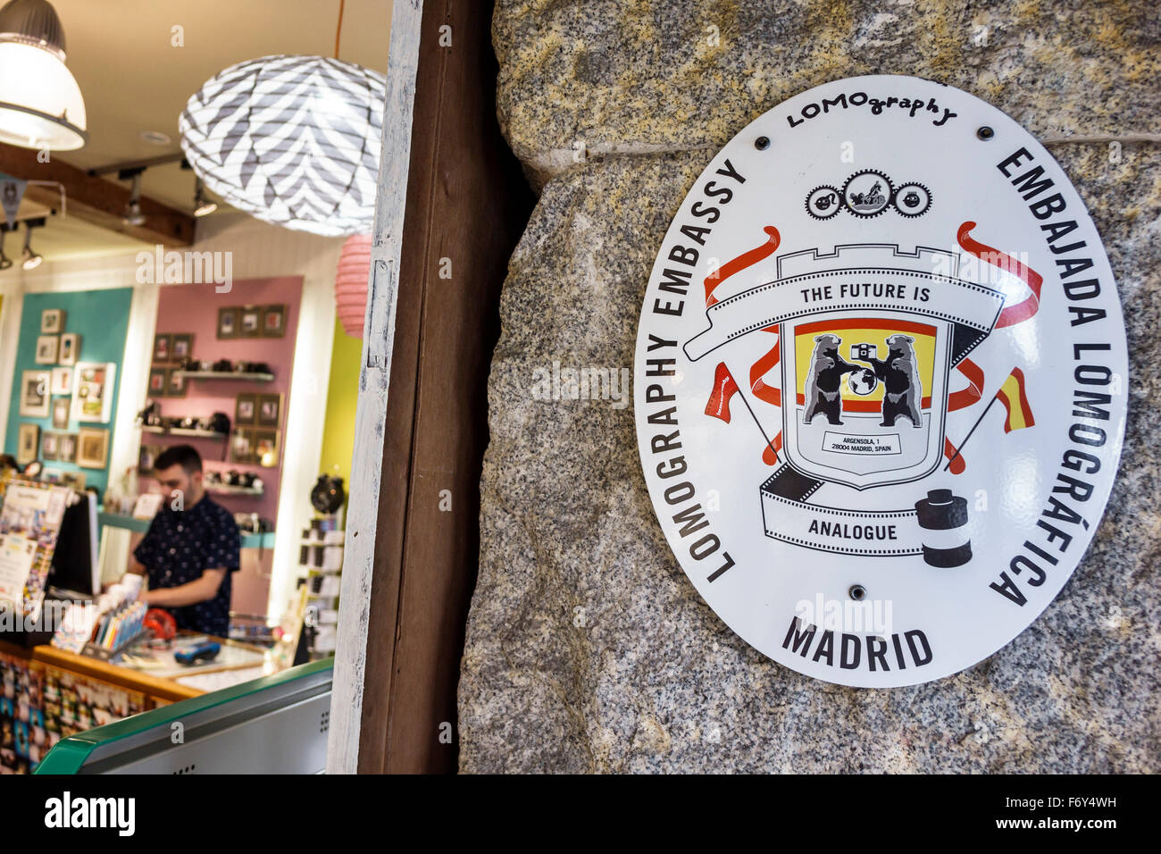 Madrid Spain,Hispanic Centro,Calle Argensola,Lomography Spain,Hispanic Caprilephoto,photography store,LCA camera,plastic,analogue camera,sign,shield,f Stock Photo