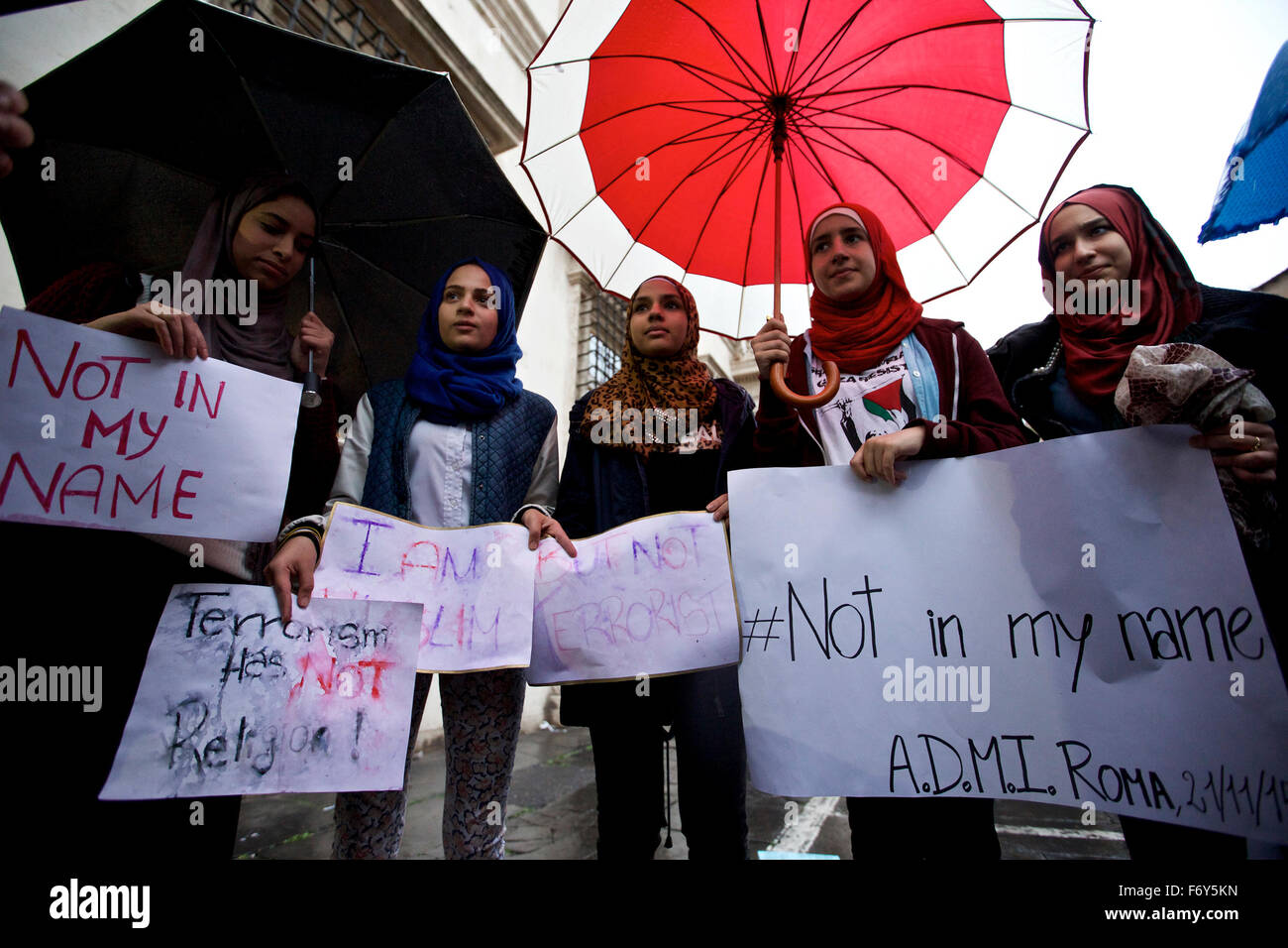 Rome, Italy. 21st Nov, 2015. Young women hold banners during a demonstration in Rome, Italy, on Nov. 21, 2015. A demonstration launched by Islamic communities with the theme "Not in My Name" is held here on Saturday to protest against the Paris terror attacks. Credit: Jin Yu/Xinhua/Alamy Live News Stock Photo