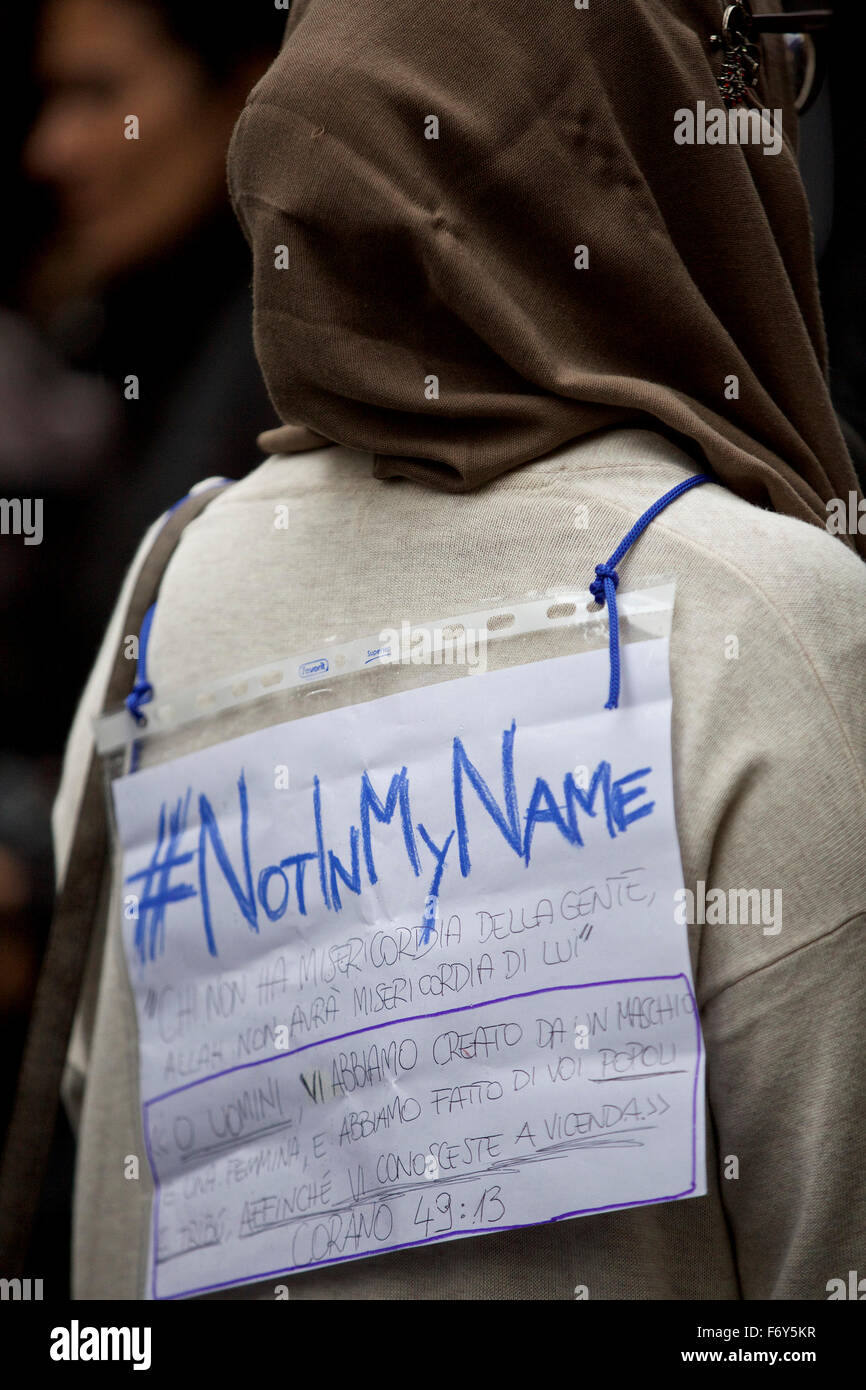 Rome, Italy. 21st Nov, 2015. A banner hanging on a woman's back reading "Not in My Name" is seen during a demonstration in Rome, Italy, on Nov. 21, 2015. A demonstration launched by Islamic communities with the theme "Not in My Name" is held here on Saturday to protest against the Paris terror attacks. Credit:  Jin Yu/Xinhua/Alamy Live News Stock Photo