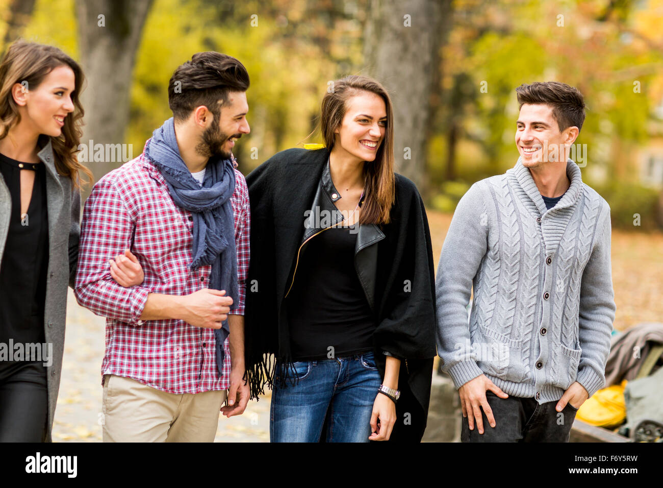 Young people in the autumn park Stock Photo